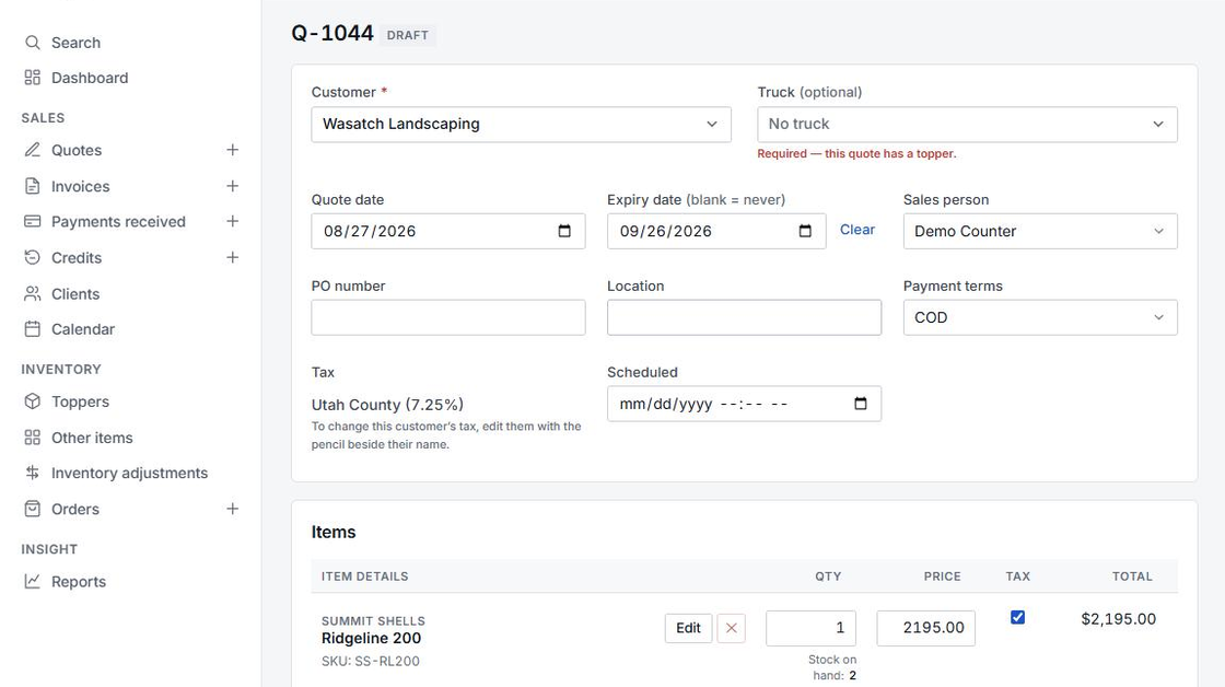 A quote open in TopperBase, with the sidebar on the left and the item lines in the middle